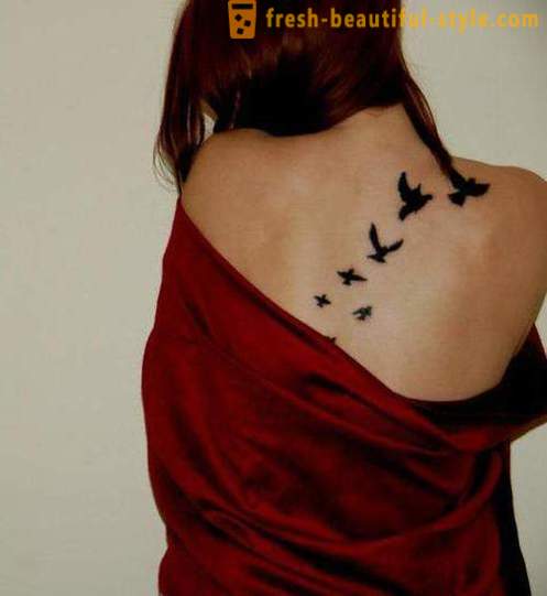 Hermosa hembra tatuaje - que cortar y donde hay una imagen