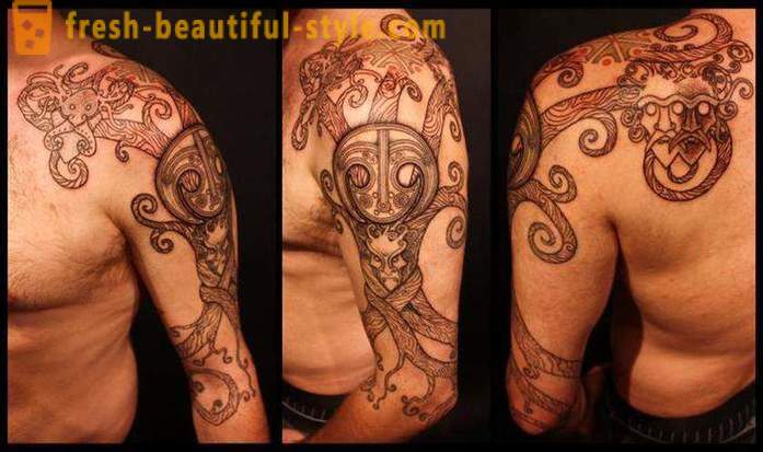 Tatuaje masculino eslava en su brazo